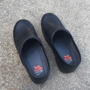 Dansko slip resistant black leather clogs